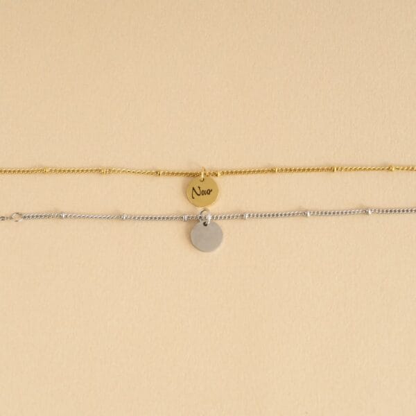 deux bracelets en acier inoxydable couleur or et argent