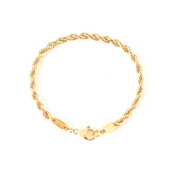 Bijou bracelet doré sur fond blanc