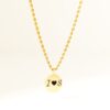 chaine dorée en forme de corde et son pendentif