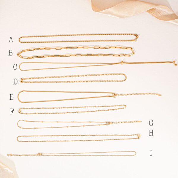 Lot de 9 chaine en acier inoxydable, dorées, numéroté de A à I